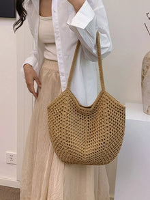 The Solara Woven Shoulder Bag by Lane & Aston, front view